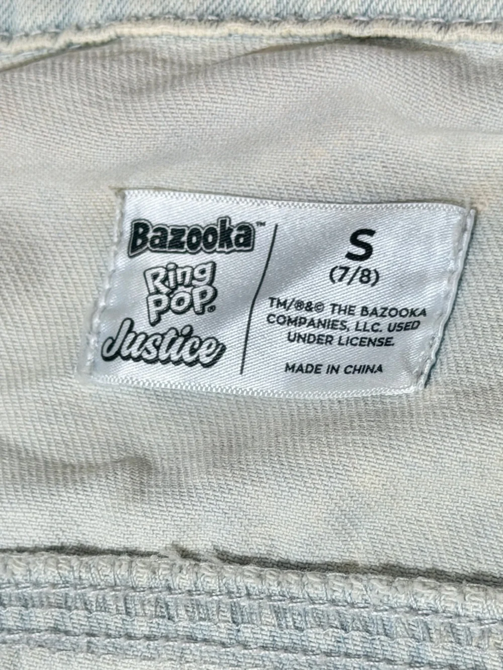 Justice White Denim Jacket with Bazooka Ring Pop Label